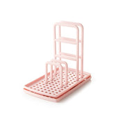 support porte éponge rose