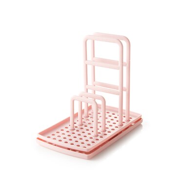 support porte éponge rose